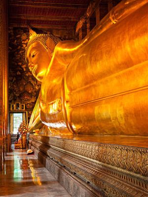 Reclining Buddha gold statue. Wat Pho, Bangkok, Thailand