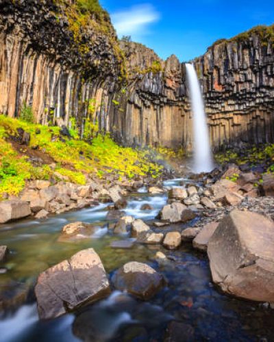 Svartifoss waterfall surrounded by basalt columns in the south of Iceland
